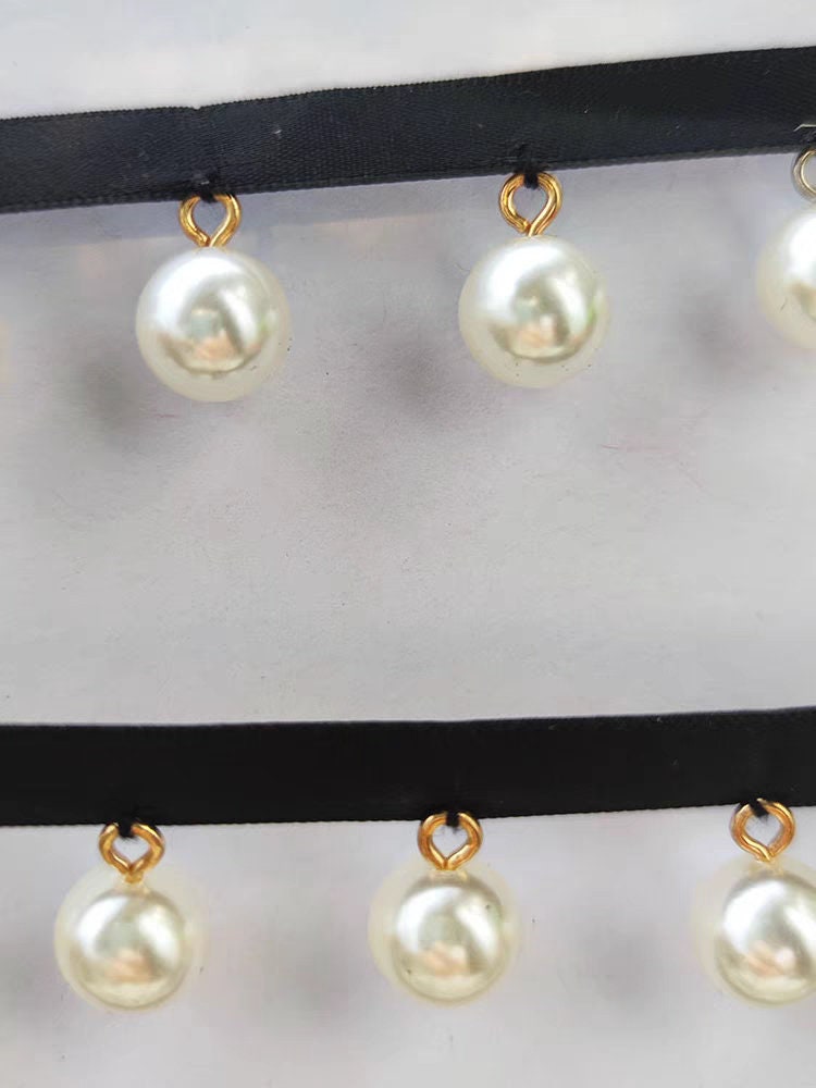 Glanzende, 90 cm lange, 12 mm parelkralen kanten franje