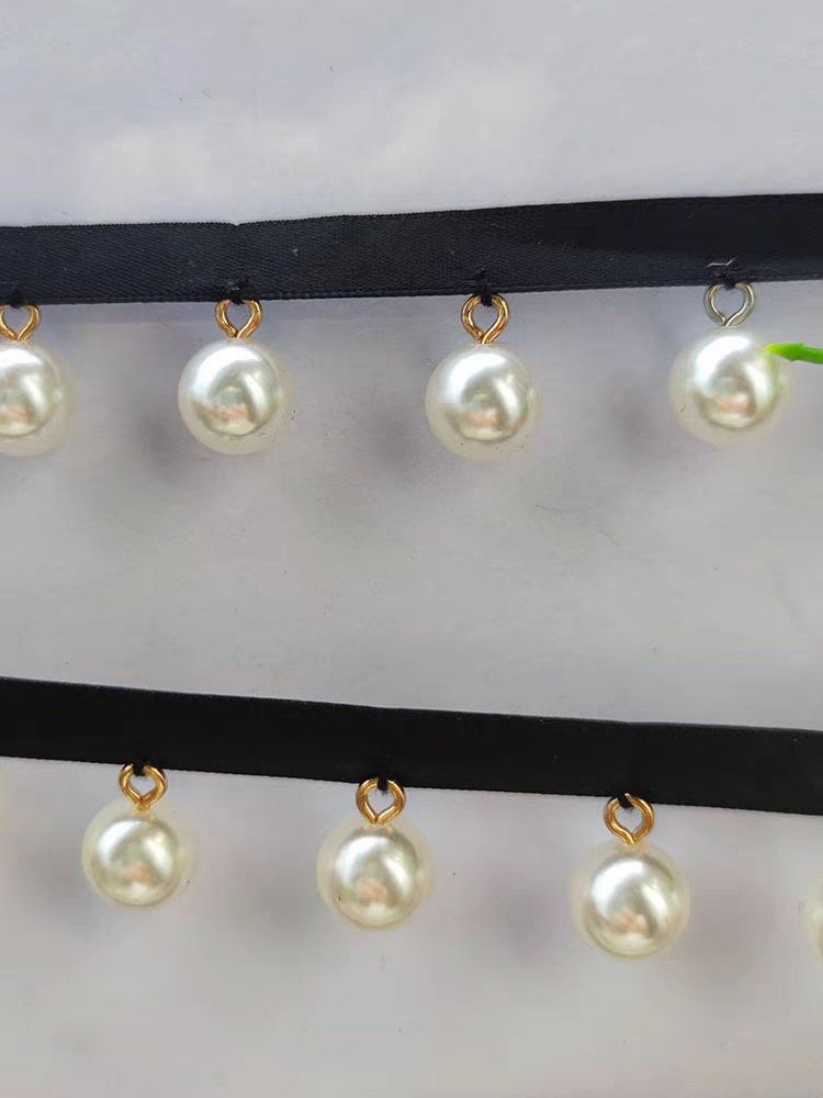 Glanzende, 90 cm lange, 12 mm parelkralen kanten franje