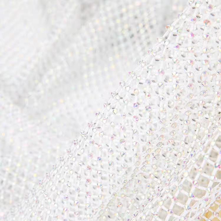 Tissu à strass : Polyester thermocollant (1 m x 120 cm)