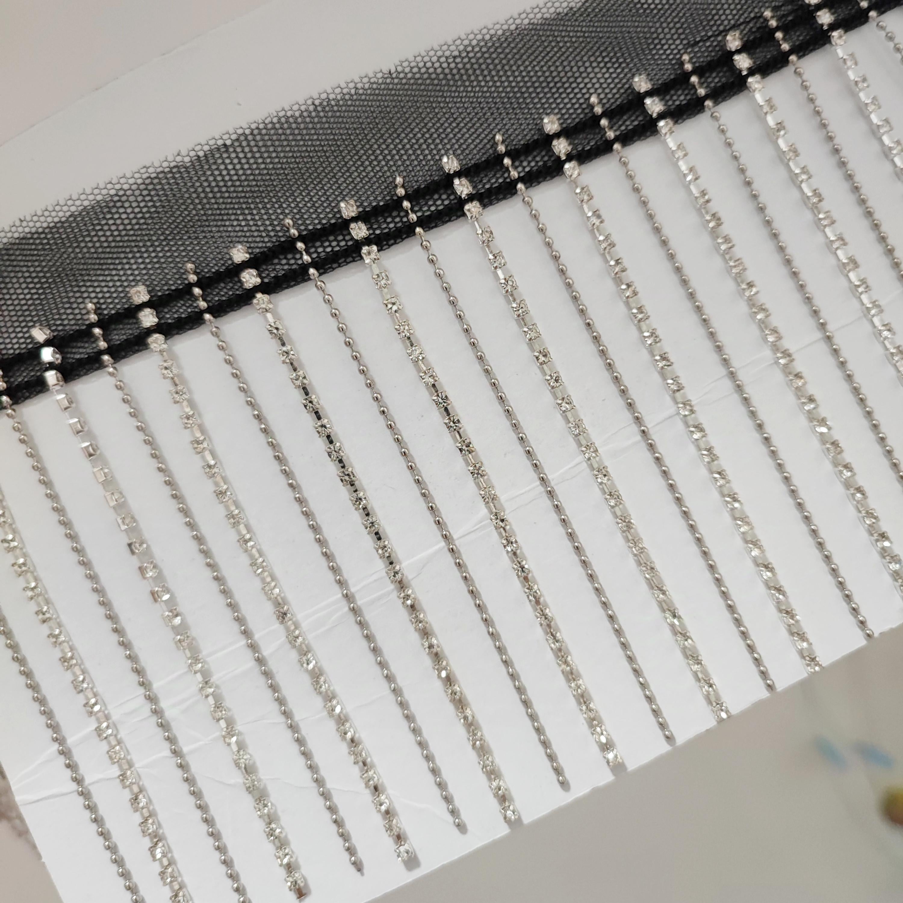 Glitterende strassfranje: koperkleurige kralenketting (90 cm lang)