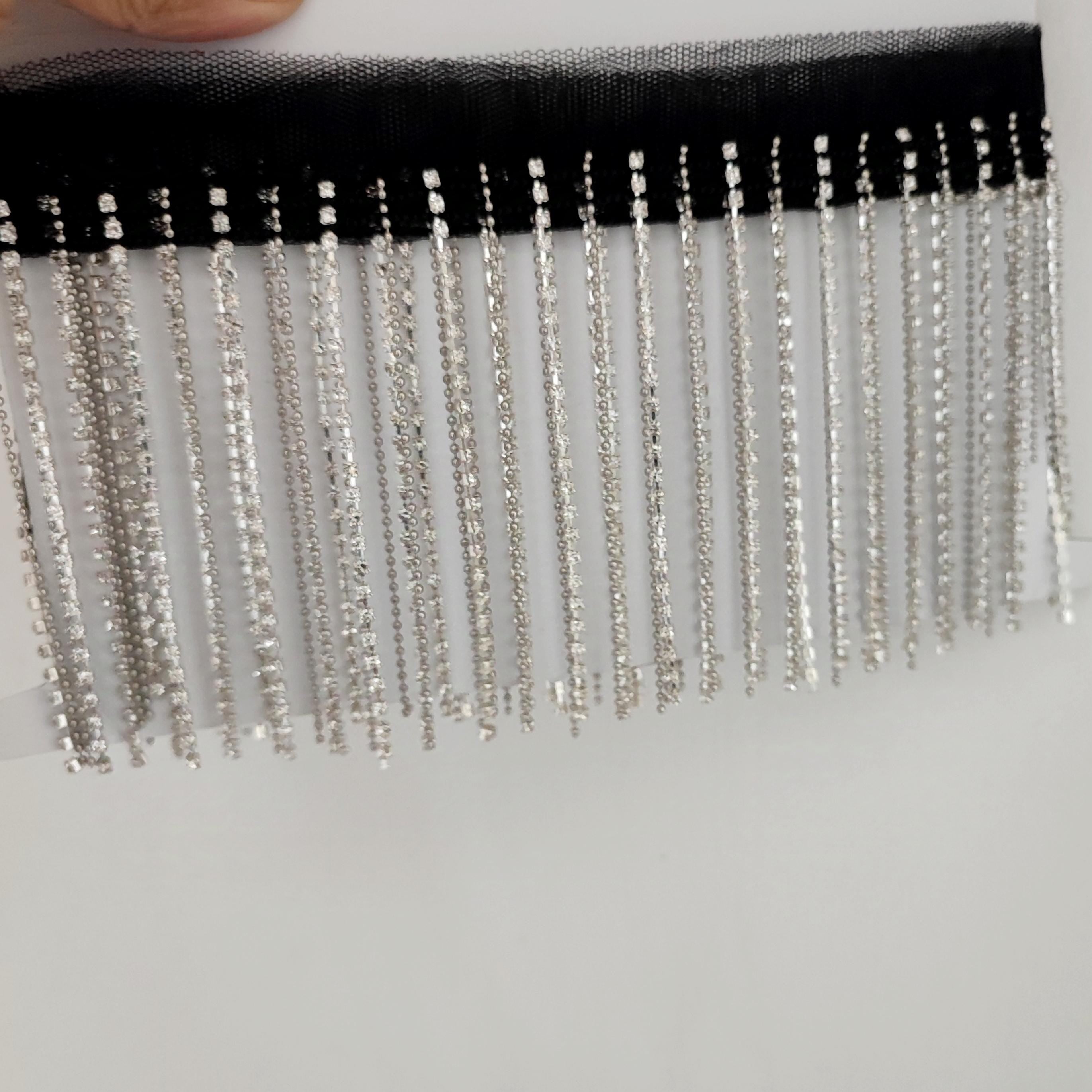 Glitterende strassfranje: koperkleurige kralenketting (90 cm lang)