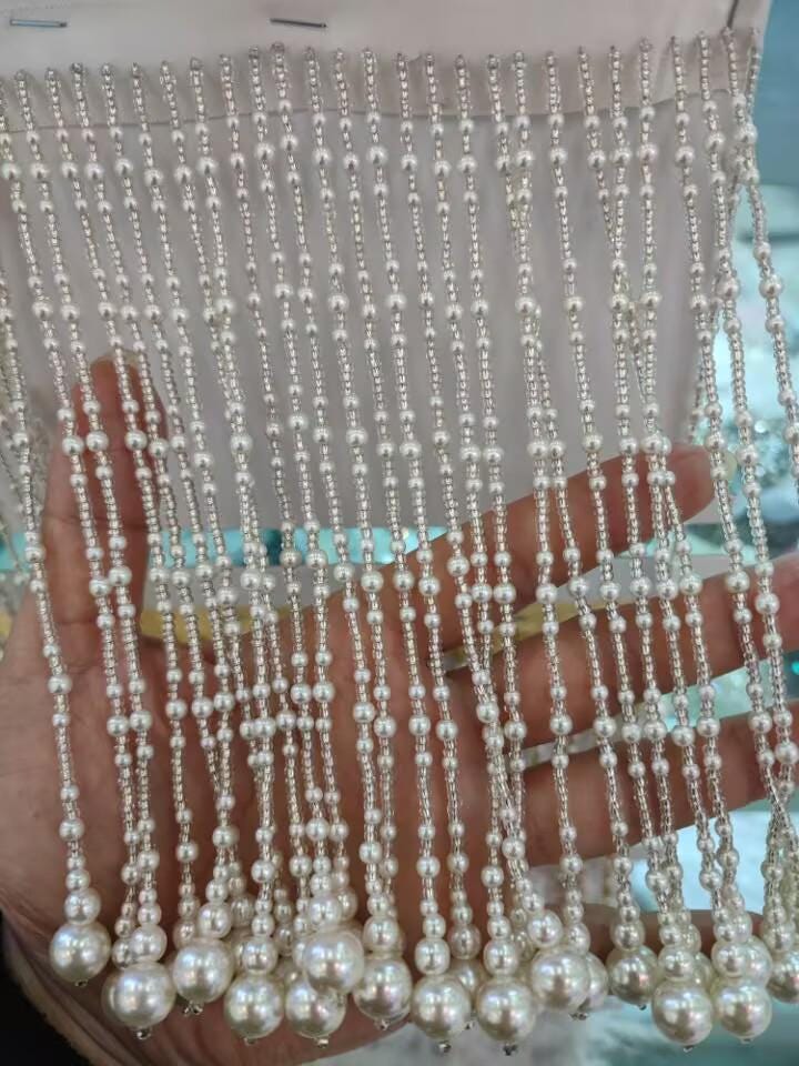 Handgemaakte 15 cm lange franje van parelmoer kralen: haute couture kostuumversiering