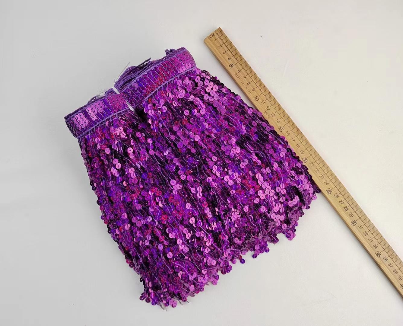 Glitterende paillettenfranje: 24 cm breed, verkrijgbaar in diverse kleuren (9,3 meter)
