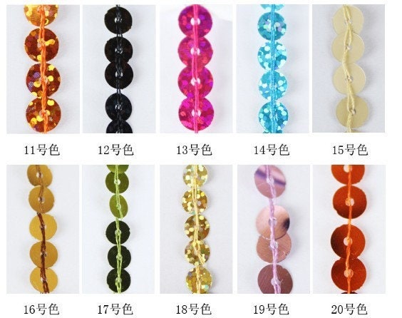 Frange à paillettes : 9 mètres, 40 cm de large, bandeau de 1,5 cm.